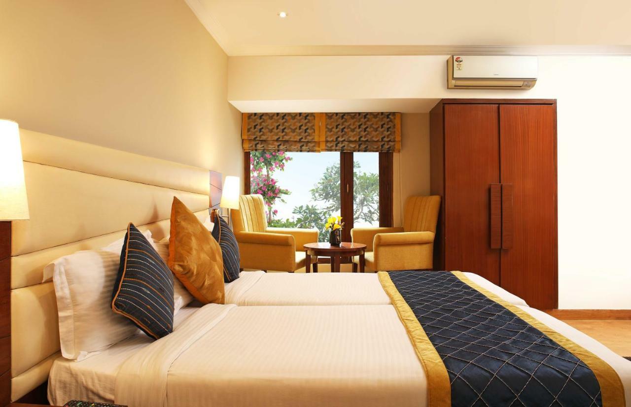 อาหุชาเรซิเดนซี Hotel นิวเดลี ภายนอก รูปภาพ