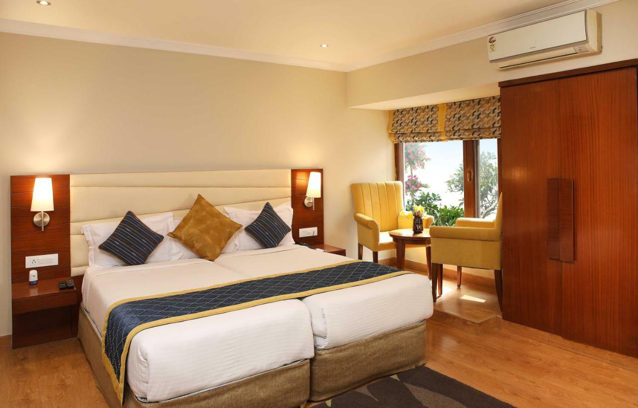 อาหุชาเรซิเดนซี Hotel นิวเดลี ภายนอก รูปภาพ