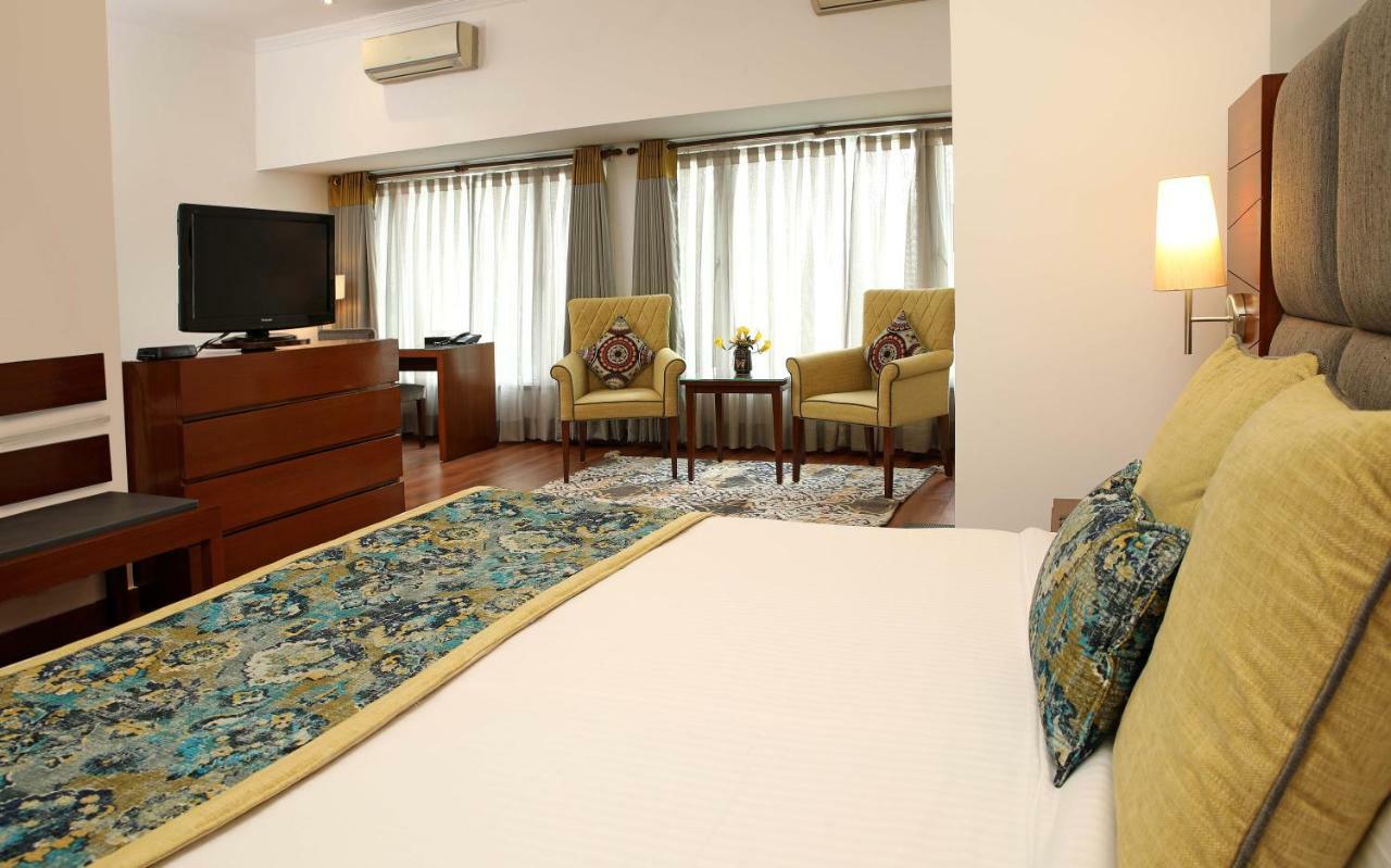 อาหุชาเรซิเดนซี Hotel นิวเดลี ภายนอก รูปภาพ
