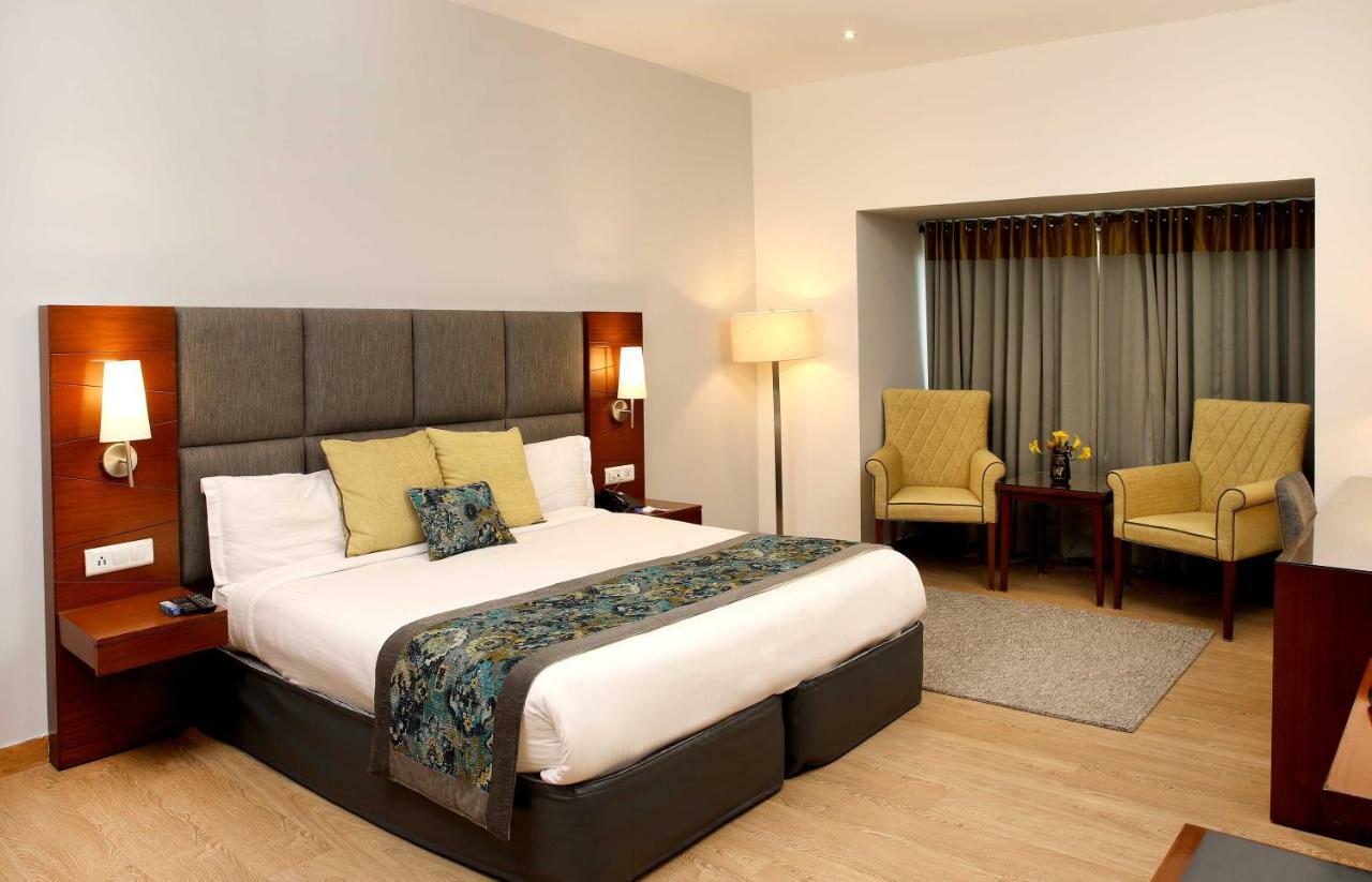อาหุชาเรซิเดนซี Hotel นิวเดลี ภายนอก รูปภาพ