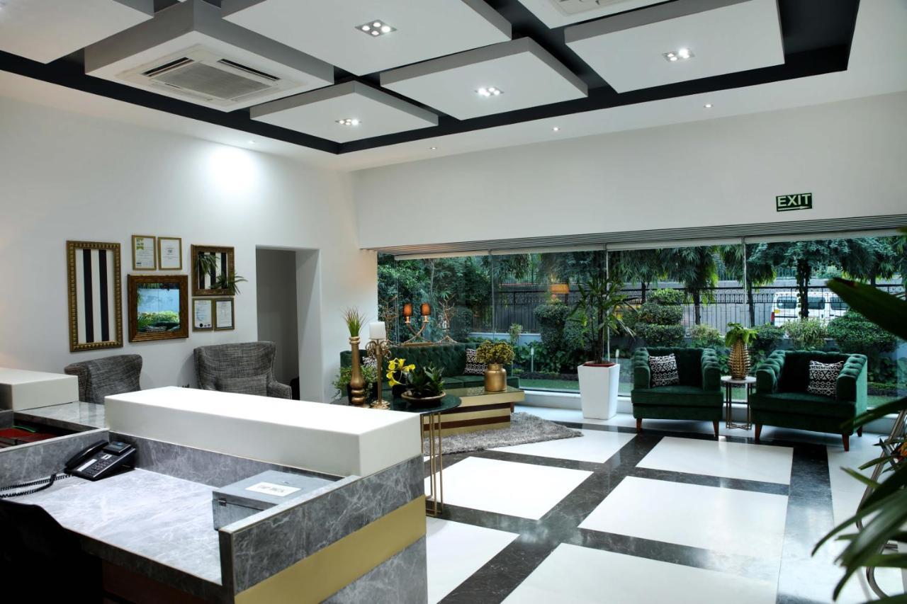 อาหุชาเรซิเดนซี Hotel นิวเดลี ภายนอก รูปภาพ